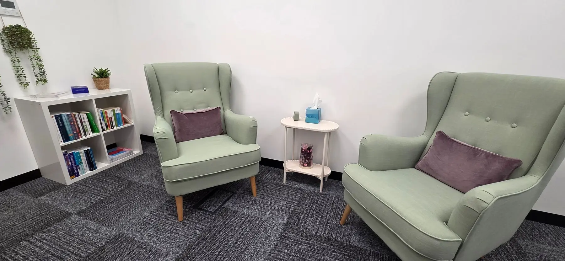 Two comfortable armchairs in the Local Counselling room in Widnes